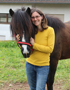 S. Neuhaus mit Pferd